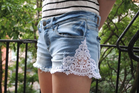 Lace-trimmed jean shorts