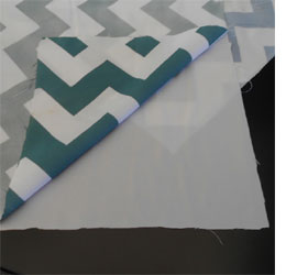 Spray paint on fabric for designer cushions