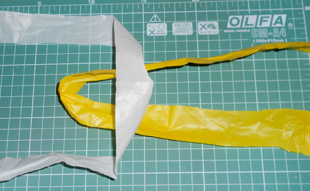 Make a skipping rope of plastic bags