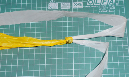 Make a skipping rope of plastic bags