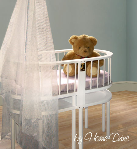 Nursery crib that becomes two chairs