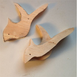 Make wooden moveable dinosaurs 