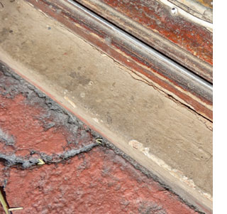 Rust-Oleum Leak Seal seals around wood windows and doors