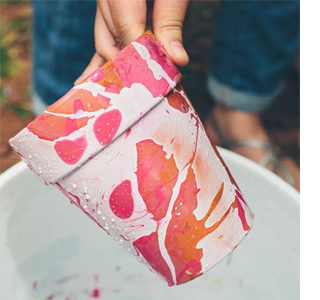 Paint pots splashed with nail varnish