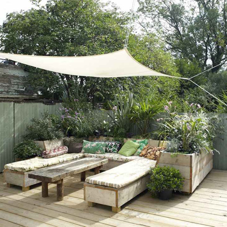 Eclectic style in vintage home reclaimed timber planters, benches and table