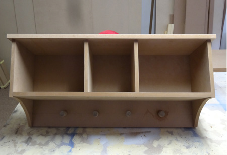 Make a storage wall shelf for boy's bedroom 