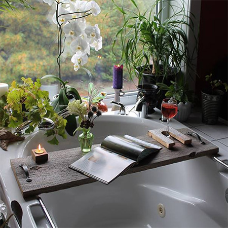 scrap piece of timber becomes bathroom tray for wine glass