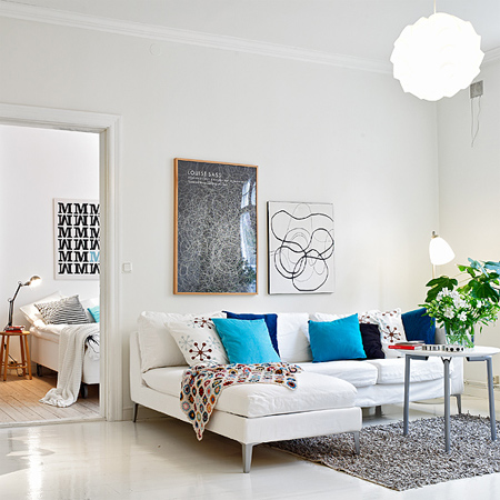 decorating with white living spaces interiors with blue accessories
