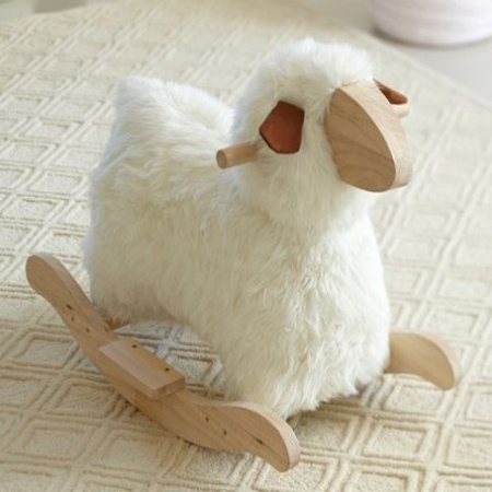 Decorate a gender-neutral nursery with a lamb or sheep theme