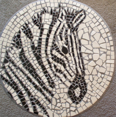 Use leftover tiles to make a mosaic tabletop