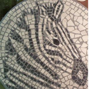 Use leftover tiles to make a mosaic tabletop zebra mosaic design