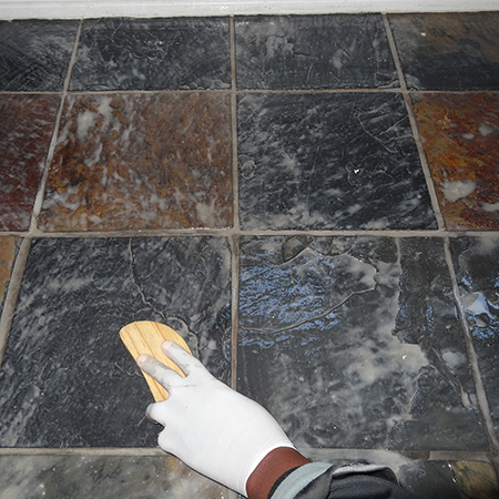 Clean and strip slate tiles with stripper and re-seal