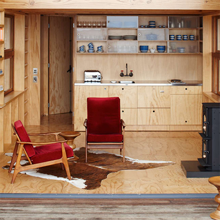 Beach house shed on sleds plywood kitchen