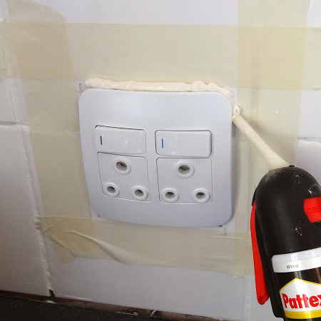use silicone sealer to cover up around power plug socket outlet