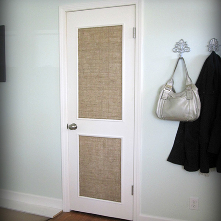 add pine moulding or trim and fabric panel to plain interior door