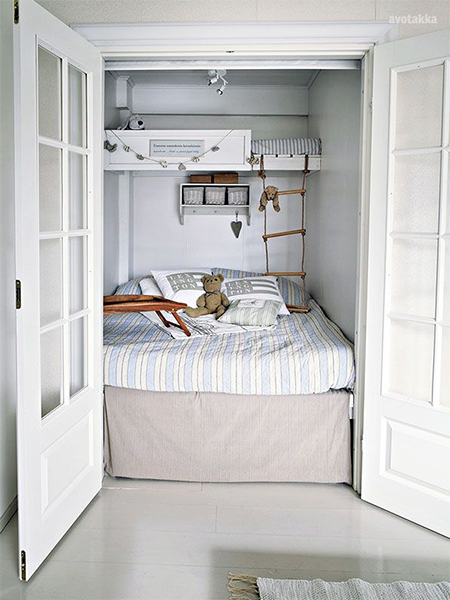 3 children bunk beds in small bedroom in closet