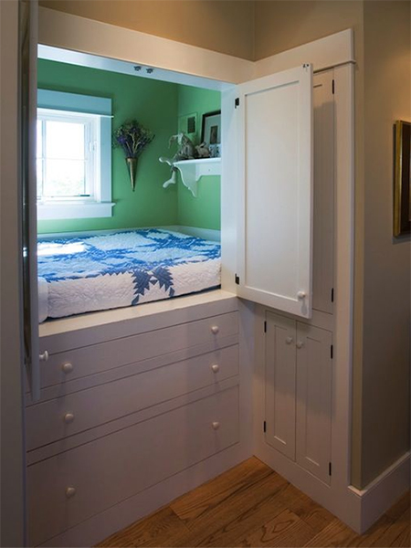 loft beds in small bedroom in cupboard