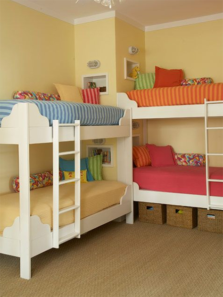 4 children bunk beds in tiny shared bedroom
