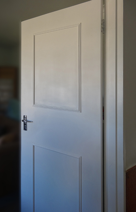  transform plain hollow-core doors into a feature using inexpensive pine moulding