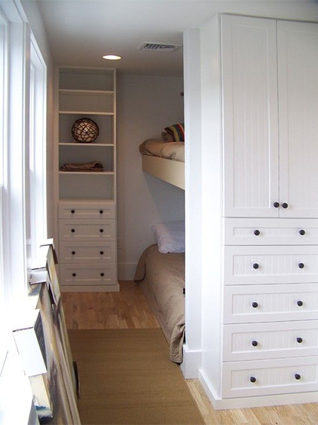 concealed bunk beds in small shared bedroom