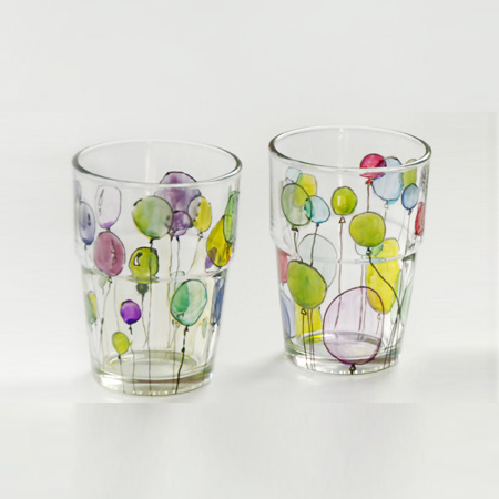 You can use glass stain to dress up inexpensive glassware