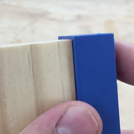 1. To make your own pockethole plugs you will need a pockethole jig, pockethole drill bit and a clamp, as well as an offcut of the wood you will be using for your project. Place the drill bit into the jig and line up as close as possible with the end of the jig. 