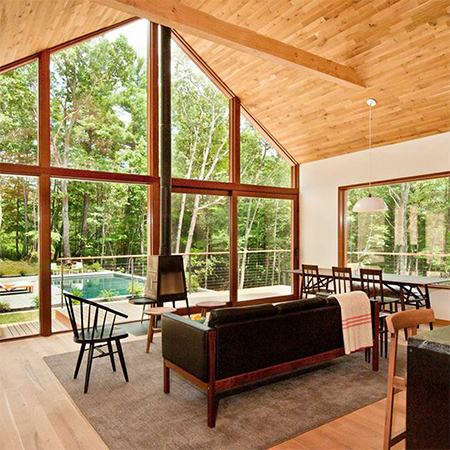 Naturally modern wood homes with wood clad ceilings and wood plank floors