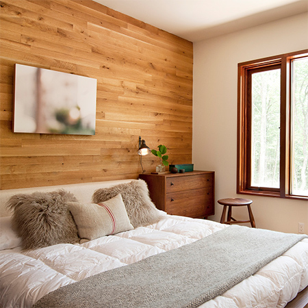 Naturally modern wood homes timber plank wall in bedroom