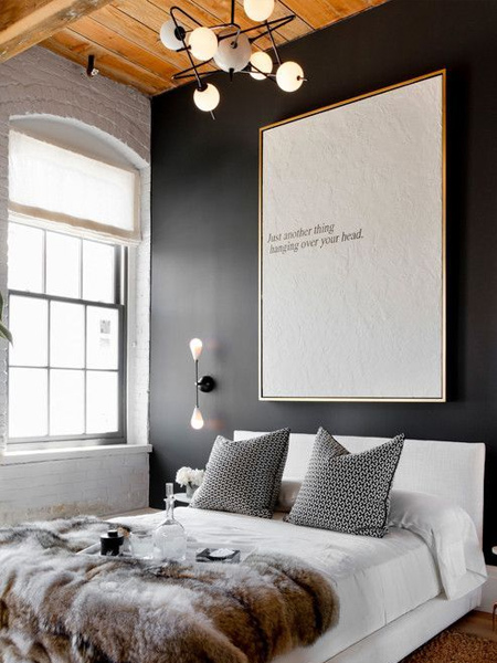 Use the power of contrast between black and white in a bedroom.