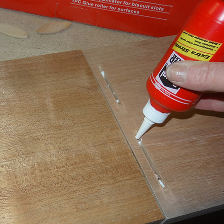 7. Pour wood glue in all the cut slots. Ponal wood glue has a nice runny consistency that is perfect when doing biscuit joints.