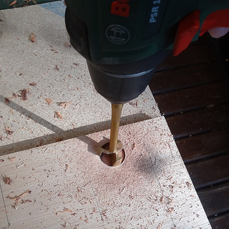 drill slots with tork craft mad bit or spade bit