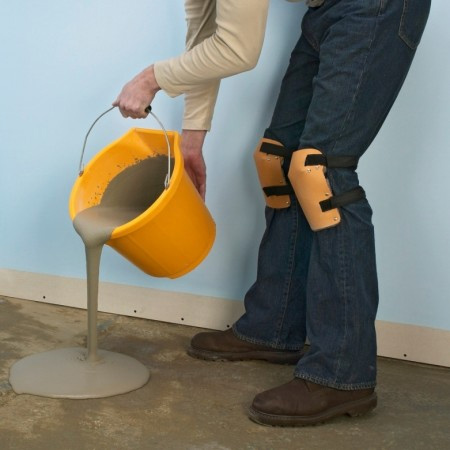 Pour the self-levelling compound onto the floor