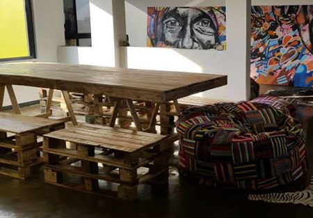 Dining tables and chairs made from reclaimed pallets