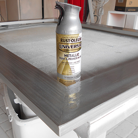 Wipe clean to remove any dust before spraying the entire frame with Rust-Oleum Universal spray paint
