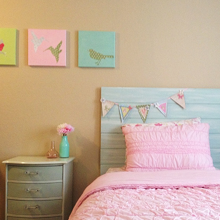 diy headboard with pine panels painted with blue paint
