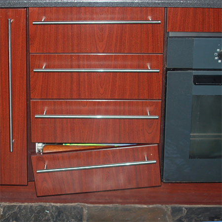 quick guide for fixing loose or broken drawer fronts and re-attaching cabinet hinges. 