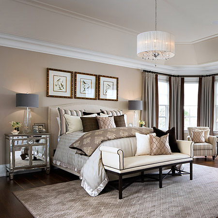 Being able to adjust lighting in a bedroom can completely alter the atmosphere. Installing a dimmer switch creates a relaxing environment conducive to a good night's sleep. Adding different levels of lighting also puts you in control of the mood. Most bedrooms have a central ceiling fixture, but also look at ambient lighting via bedside lamps or low-voltage ceiling lights. 