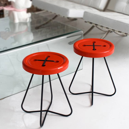 The button stools have a powder coated mild steel frame