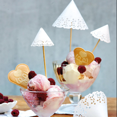Oh so pretty desserts! Small paper doilies curled into cone shapes are hot-glued onto a cocktail stick or toothpick to make an elegant umbrella. 