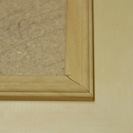Close up of the moulding fitted on top around the centre square. The moulding overhangs by approximately 5mm to provide a lip that will hold your glass in place