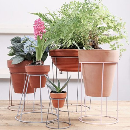 Upcycle old lampshades into plant stands