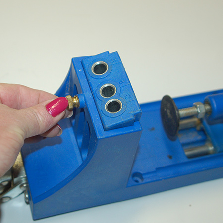The drill guide (shown below) can be removed from the clamping system and used in conjunction with the clamp for larger projects that won't fit in the clamping system.
