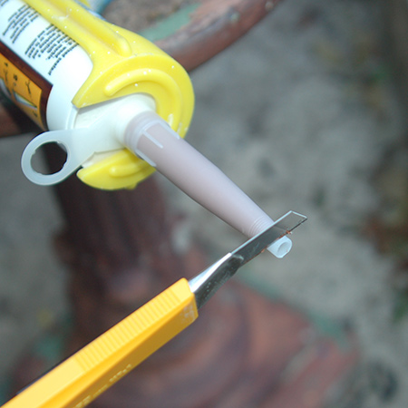 Use a craft knife to cut the end of the Wood Mate cartridge tip. 
