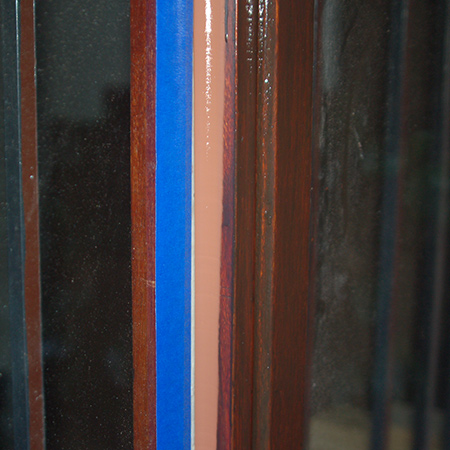 Use a profile to gently - and slowly - run over the top of the sealer to even out and push down into the gap between the glass and the frame. This gives a professional finishing touch to the finished edge.