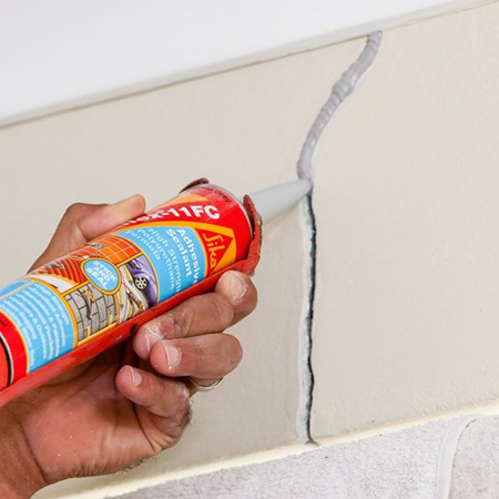 How to fix small cracks in walls
