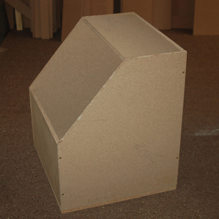 2. Assemble the box oven by securing the sides to the back and front. Place and secure the top and then attach the base.