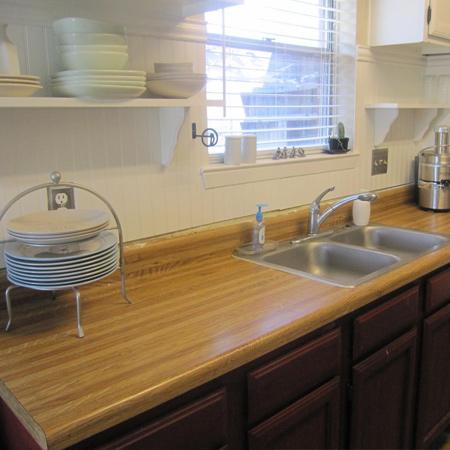 use wood planks to make your own genuine wood countertops and add true warmth and beauty to a kitchen.