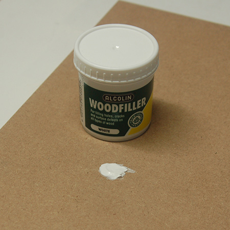 use alcolin wood filler to cover up countersunk screws