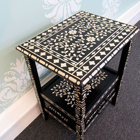 You can even add a stencil design to a plain, painted dining table