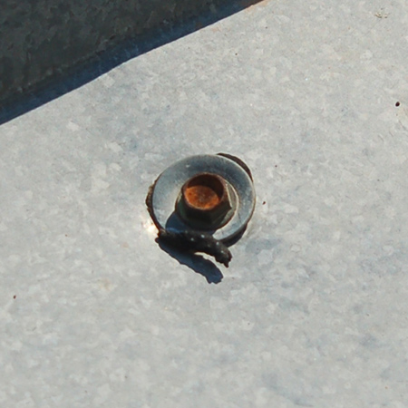 Drips and leaks in IBR roofing can be caused by something as simple as a worn roofing screw. Some have a rubber seal that degrades, and others develop rust.